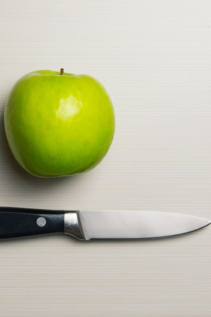 paring knife and apple